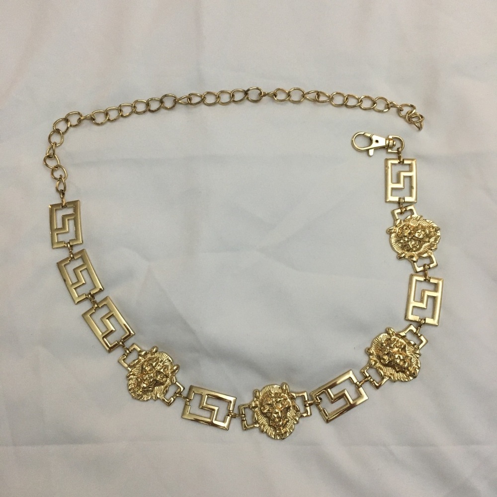 Gold tone metal waist belt with lions